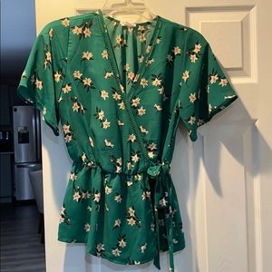 Green floral blouse